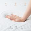 A hand gently touches a mattress, accompanied by the text "touch the mattress" above it.